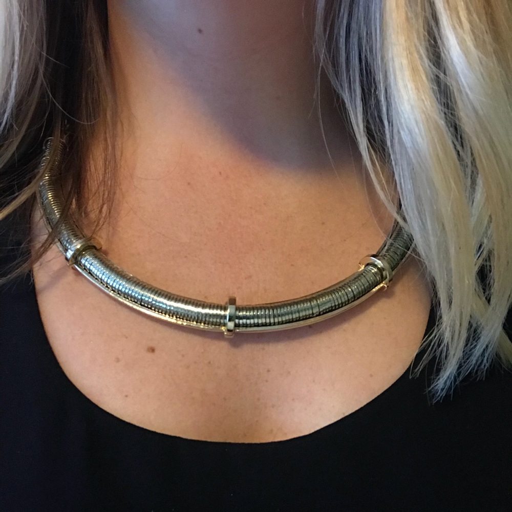 Egyptian style gold tone necklace.